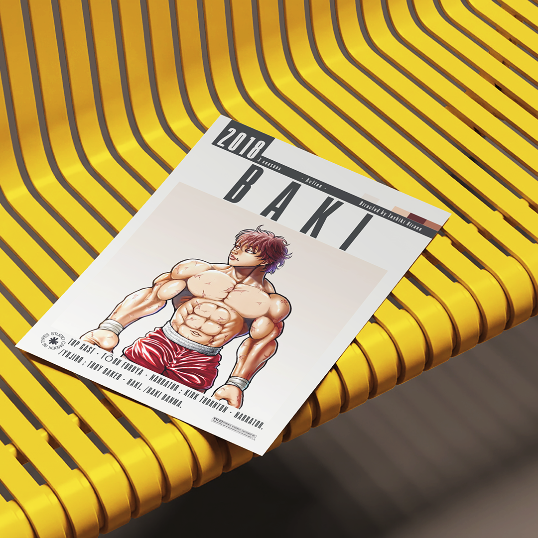 A magazine or book titled "BAKI" with an illustrated muscular male character on the cover, placed on a bright yellow ribbed bench.
