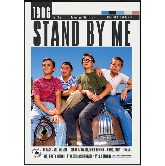 The movie poster for 'Stand By Me' (1986) featuring four young boys sitting on a vintage car against a blue sky. The poster has a white background with black text and a thin black border.