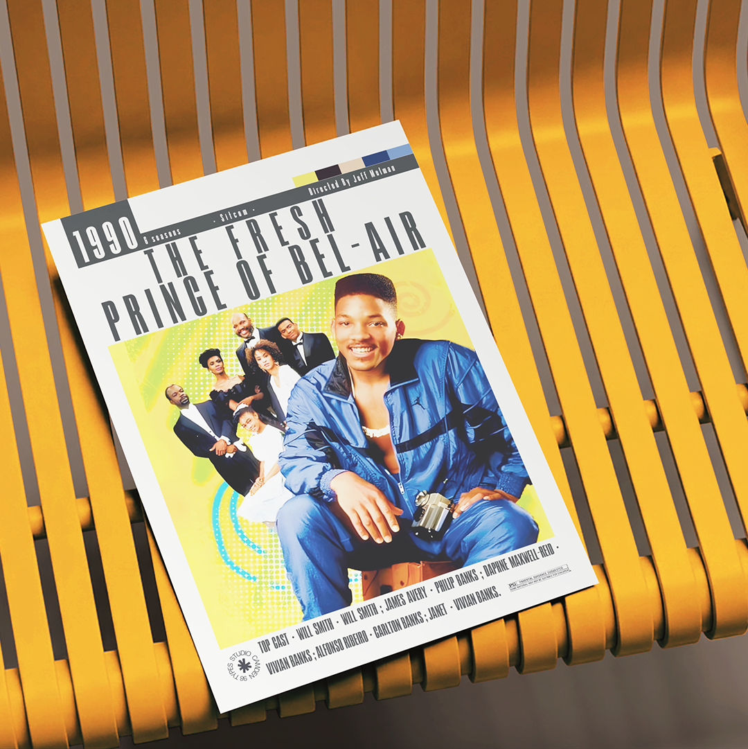 A printed magazine or book cover titled "1990: The Fresh Prince of Bel-Air" lies on a yellow slatted chair. The cover features a colorful photo of Will Smith in a blue jumpsuit, with other cast members in the background.