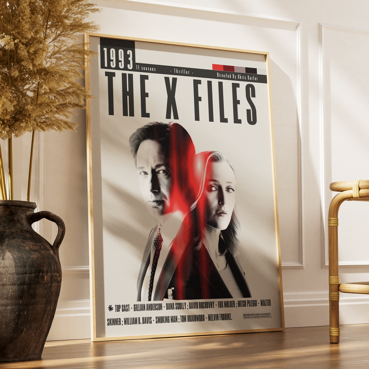 Framed 'The X-Files' poster on a wall with decorative elements.