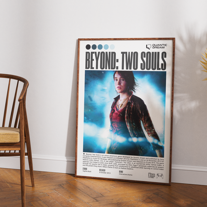 A framed movie poster for 'Beyond: Two Souls' leaning against a white wall on a wooden floor, next to a wooden chair.