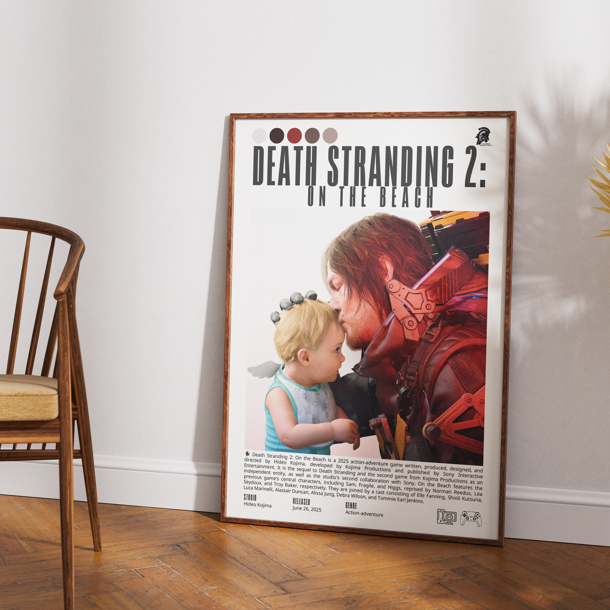 A framed 'Death Stranding 2: On the Beach' art print leaning against a white wall on a wooden floor, next to a wooden chair.