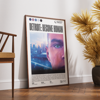 A framed vertical poster titled 'DETROIT: BECOME HUMAN' leaning against a white wall on a wood floor, with a wooden chair on the left and a potted palm on the right.