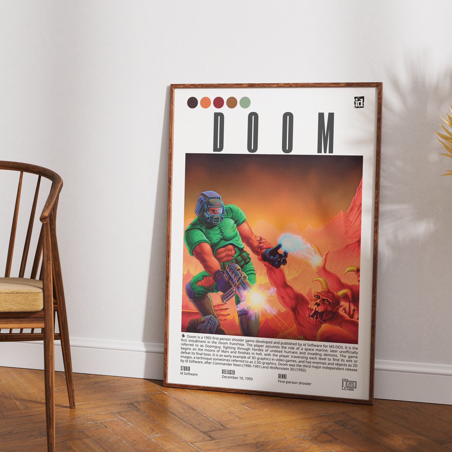 A framed retro-style poster featuring the word 'DOOM' and a colorful sci-fi illustration leaning against a white wall on a wood floor, with part of a wooden chair visible on the left.