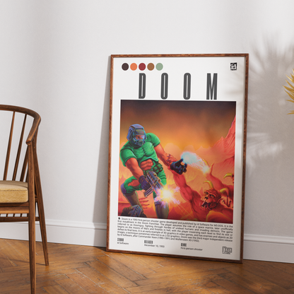 A framed retro-style poster featuring the word 'DOOM' and a colorful sci-fi illustration leaning against a white wall on a wood floor, with part of a wooden chair visible on the left.