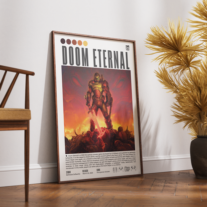 A framed Doom Eternal poster leaning against a white wall on a wooden floor, with a wooden chair on the left and a potted palm on the right.