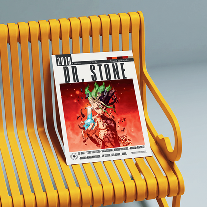 A 2019 Dr. Stone magazine or comic book issue is displayed on a modern yellow slatted bench against a neutral gray background.