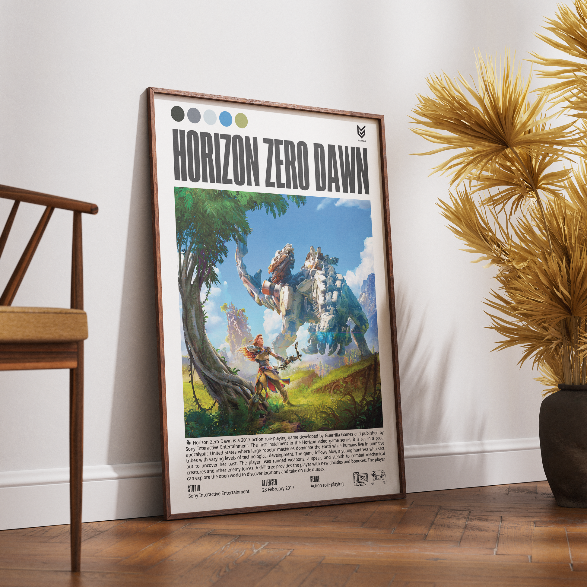 A framed Horizon Zero Dawn poster leaning against a white wall on a wooden floor, with a wooden chair on the left and a potted palm on the right.
