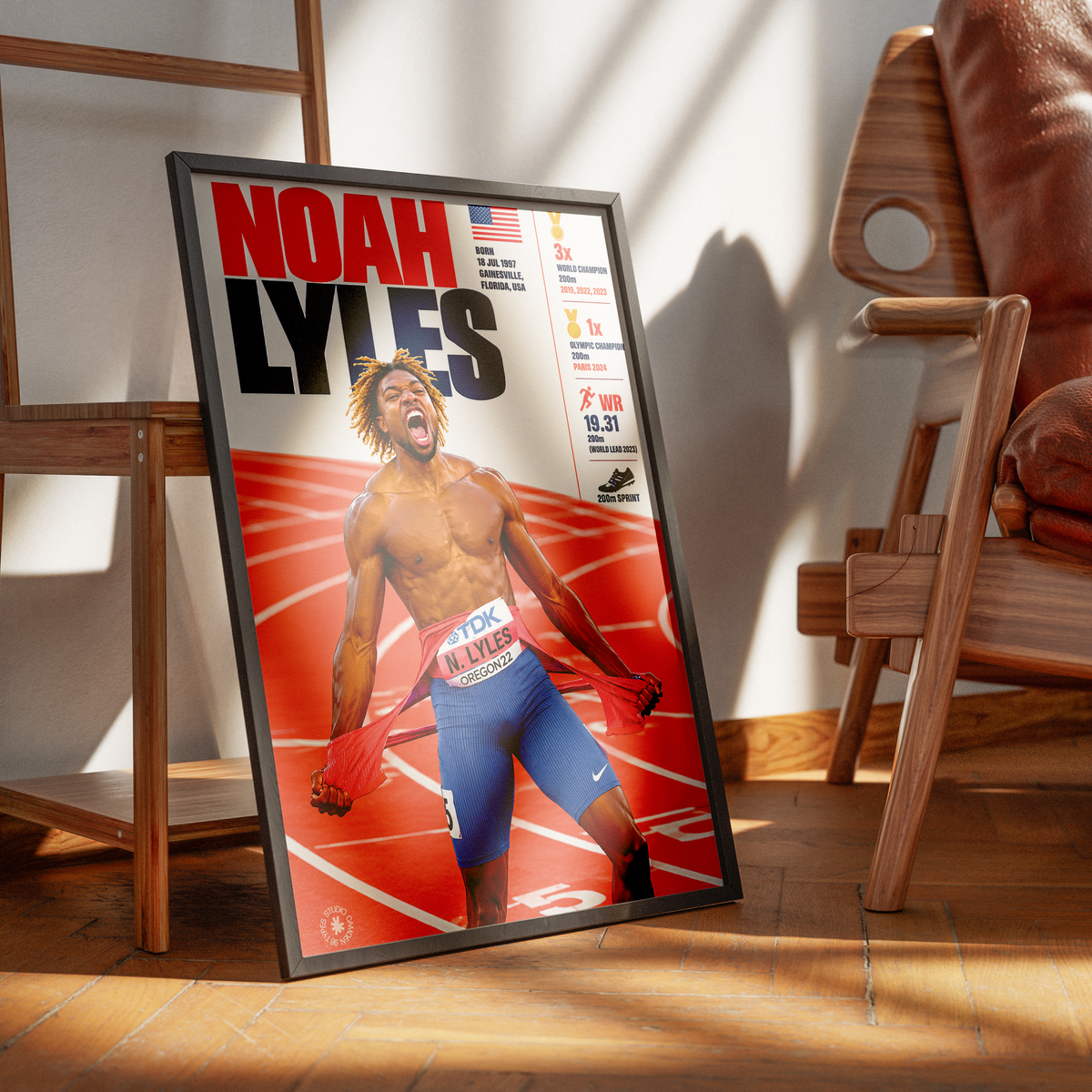 A framed sports poster of athlete Noah Lyles leaning against a wall in a modern room with wooden furniture and warm sunlight.