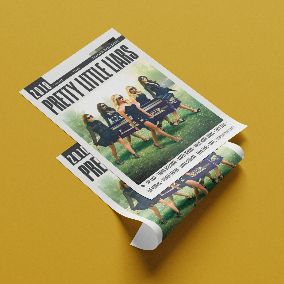 A rolled poster or magazine-style print featuring the text 'PRETTY LITTLE LIARS' and a group photo of four women sitting on a bench, displayed on a solid mustard-yellow background.