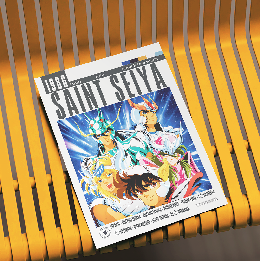 A printed Saint Seiya 1986 film poster lies on a yellow slatted bench. The poster features colorful anime artwork with multiple characters and large 'SAINT SEiya' title text.