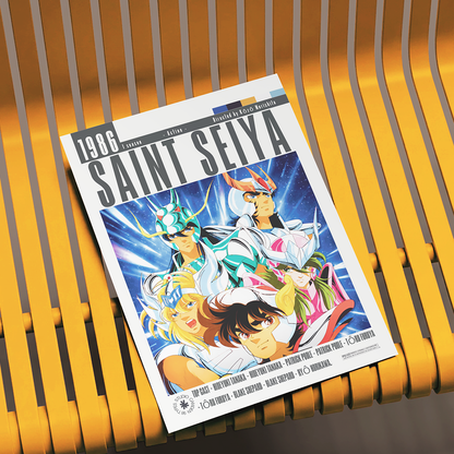 A printed Saint Seiya 1986 film poster lies on a yellow slatted bench. The poster features colorful anime artwork with multiple characters and large 'SAINT SEiya' title text.