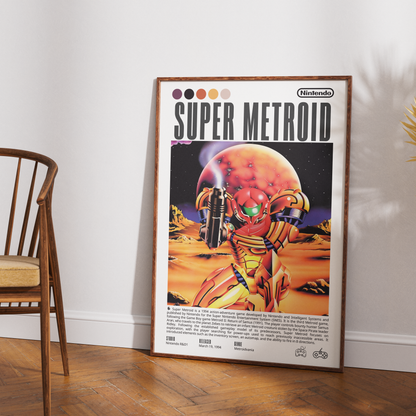 A framed retro-style Super Metroid poster leaning against a white wall on a wood floor, with part of a wooden chair visible on the left. The poster shows Samus in a gold and red suit against a desert-like scene with a large orange planet.