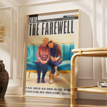 A framed poster titled "THE FAREWELL 2019" leaning against a white wall in a styled interior. The poster features a photo of an elderly couple sitting on a turquoise sofa, with large black title text at the top.
