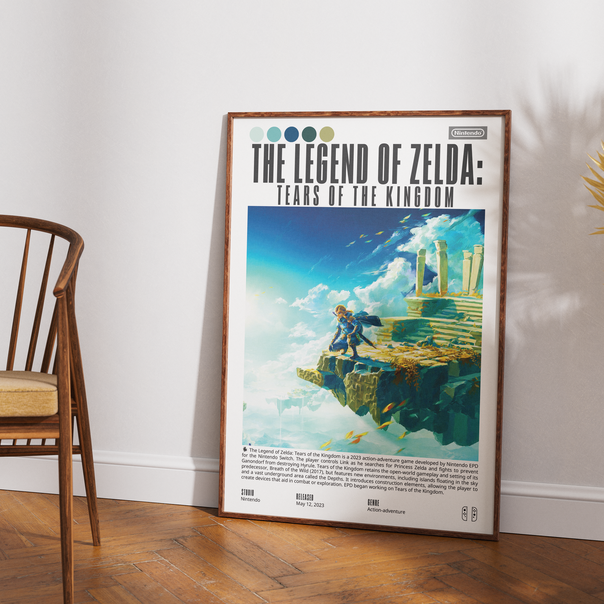 A framed retro-style poster of 'The Legend of Zelda: Tears of the Kingdom' leaning against a white wall on a wooden floor, next to a wooden chair.