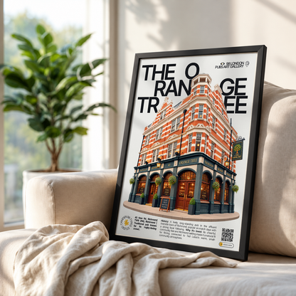 A framed poster leaning against a beige sofa in a bright room, showing a stylized illustration of a red-orange brick pub with large black text reading 'THE ORANGE TREE.' The scene includes a plant, window light, and draped blanket, making this a lifestyle product presentation.