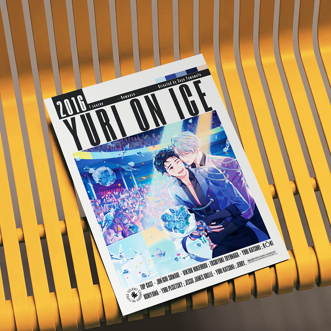 A magazine or book cover titled "YURI ON ICE 2016" lies on a yellow slatted bench. The cover features anime-style artwork of two male characters in a blue-toned scene, with event text including "EMOTION" and "BUILDING A BIPOLAR CYCLE.