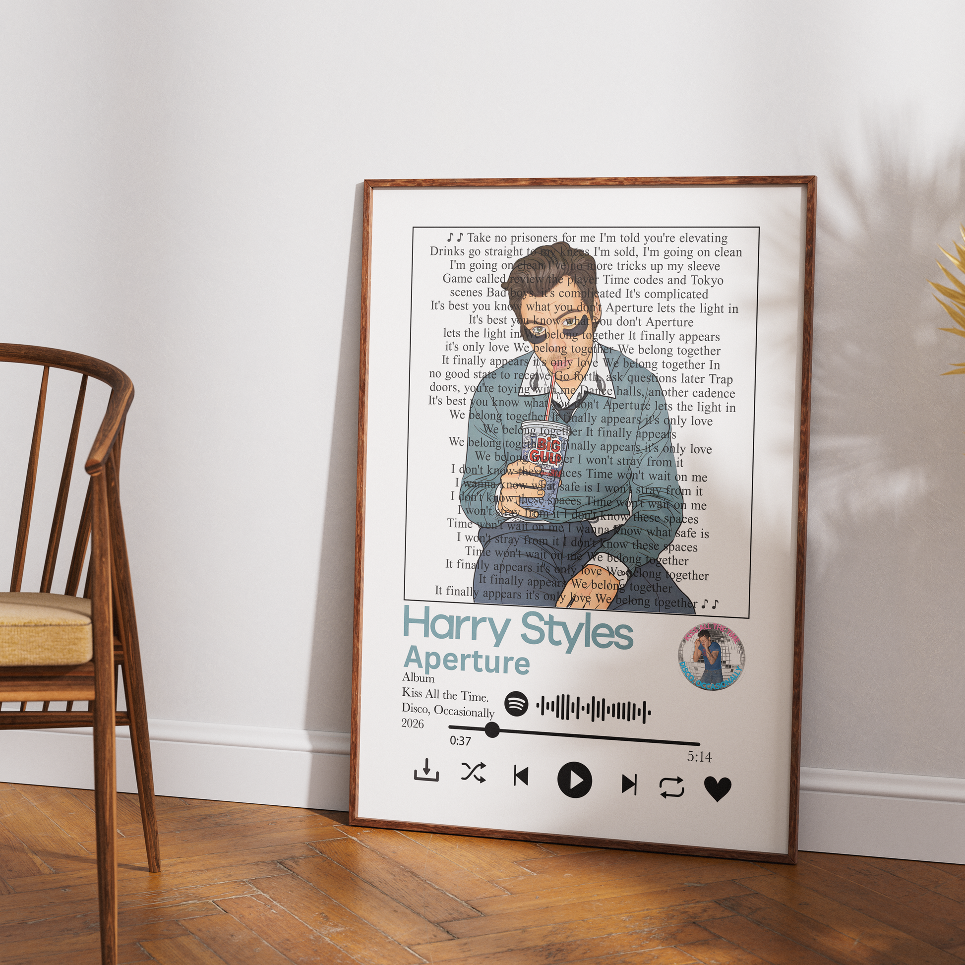 A framed personalized music poster featuring a portrait of Harry Styles with song lyrics and the text 'Harry Styles Aperture' styled like a music player interface, leaning against a white wall on a wooden floor next to a wooden chair.